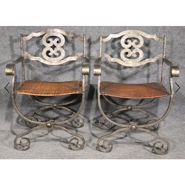 Wild pair of metal armchairs with wicker seats. Great for indoor or outdoor use. Please confirm location. SS61-101122