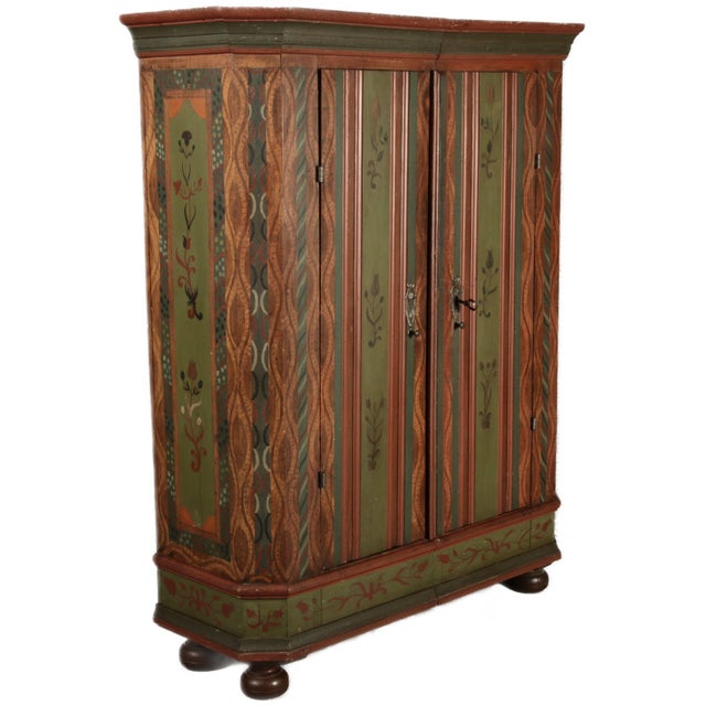 Age and Origin: The cabinet probably dates back to the 18th century and is likely from Nuremberg, Germany. Dimensions:...