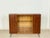 A stylish mid-century highboard from the 1960s. This piece of furniture impresses with its clean lines, the elegant...