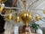 Make a statement with this stunning vintage Murano-style chandelier featuring elegant hand-blown amber and clear glass...