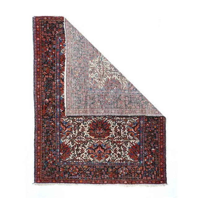 Not really and a fraction Karaja, but a genuine single-wefted Heriz scatter with an off white field displaying one...