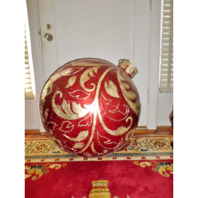 This is a Christmas Store Display/ Prop Vintage Fiberglass Ornate 30" Christmas Ornament that is a Cherry Clear Coat Red...
