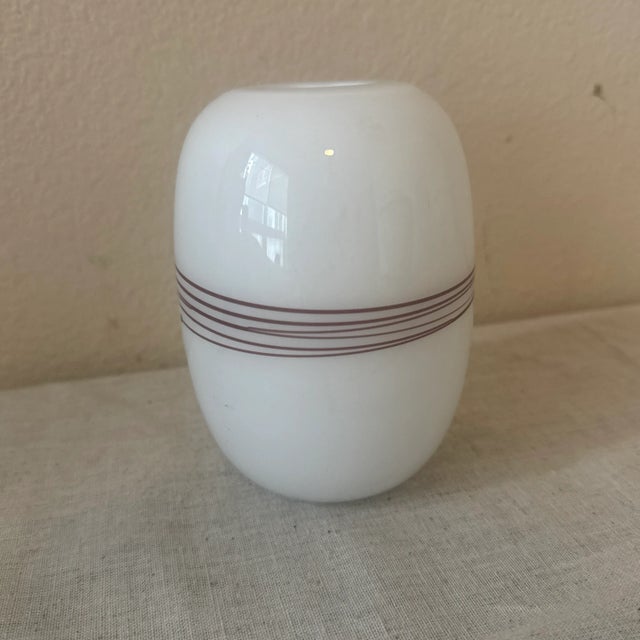 Add a touch of iconic Scandinavian design to your space with this exquisite "Melody" Vase, designed by renowned Danish...