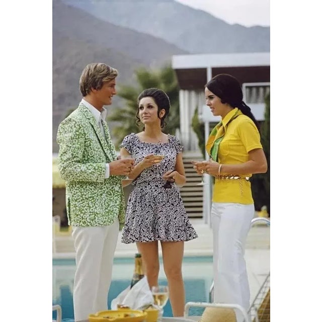 Poolside Fashions 1970 by Slim Aarons Slim Aarons Limited Estate Edition Guests by the pool at Nelda Linsk’s desert house...