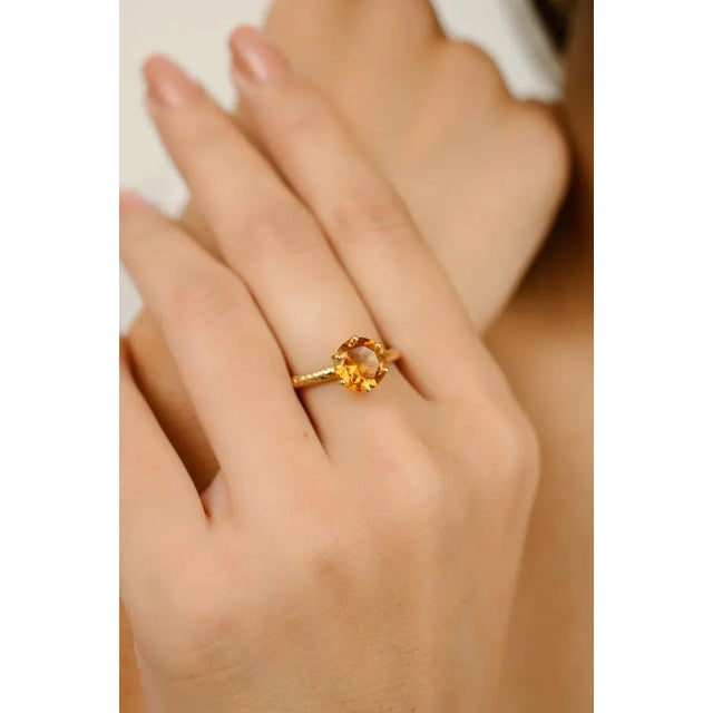 This is part of Chairish’s Fine Jewelry assortment. Round Cut Citrine Gemstone Solitaire Ring in 14K Gold featuring...