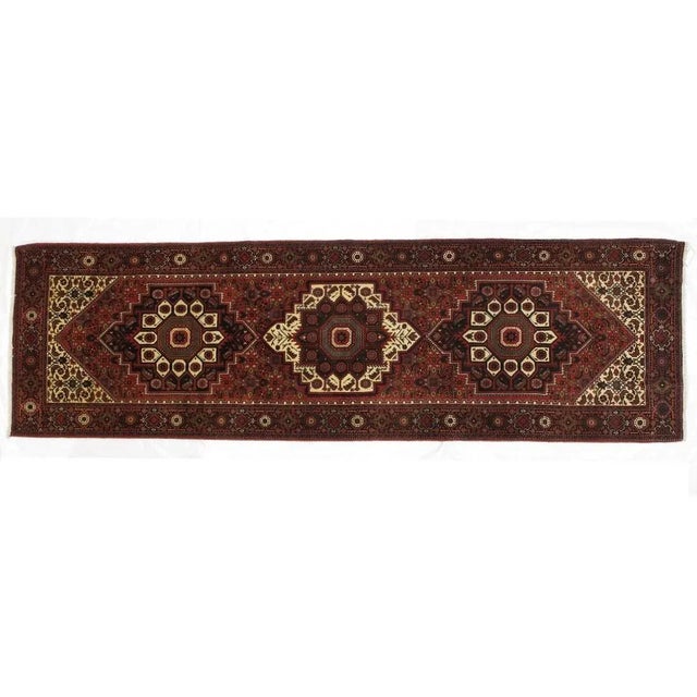 This master piece is a wool pile genuine hand made exceptionally fine Persian Bijar runner-