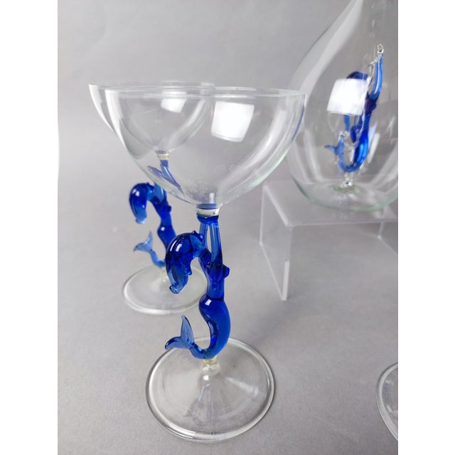 A super rare liqueur set in clear glass with blue dancers from Lauscha, consisting of 5 beautiful and incredibly delicate,...