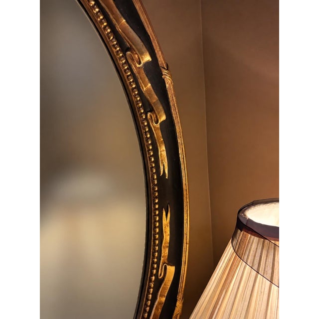 Vintage Federal Revival Black and Gold Parcel-Gilt Oval Wall Mirror For Sale - Image 4 of 6