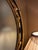 Vintage Federal Revival Black and Gold Parcel-Gilt Oval Wall Mirror For Sale - Image 4 of 6