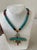 Stunning and rare mid-century Native American turquoise necklace with red coral detail and eagle pendant.