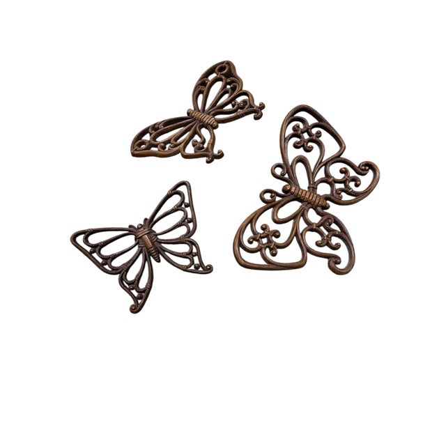 Home Interior Homeco resin butterflies. Includes set of 3 all with makers marks on back and hanging hardware built into...