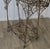 A Regency Wire Work Plant Stand The planter has an upper basket and a lower shelf, it stands on curled feet. This is an...