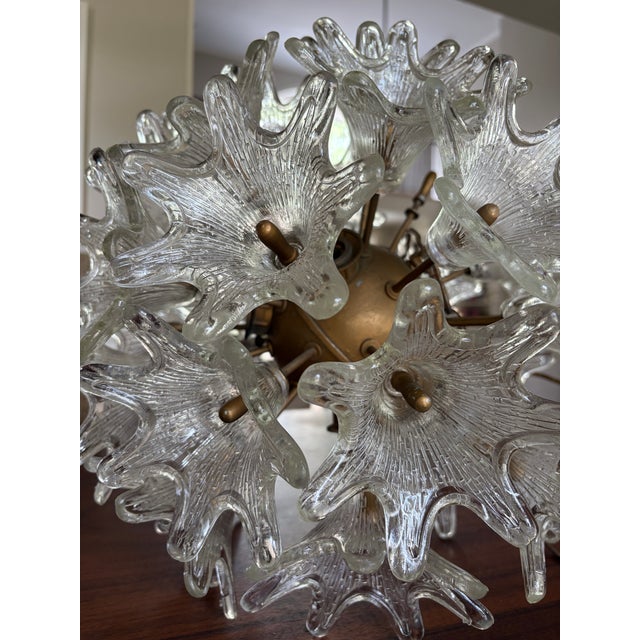 A spectacular vintage Italian Murano-style Sputnik chandelier executed in the manner of the celebrated Paolo Venini for...