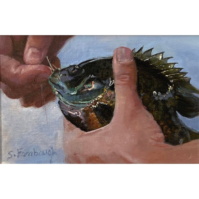 Catch and Release by Sheri Farabaugh | Oil on Hardboard Hand holding a fish during catch and release. For Sale