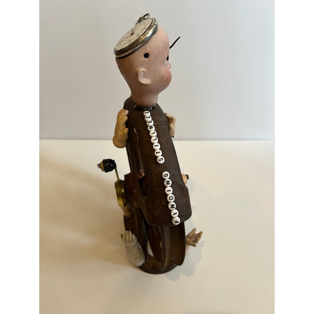 Brown Mixed Media Tabletop Sculpture With Iron Pulley and Doll Parts For Sale - Image 8 of 9