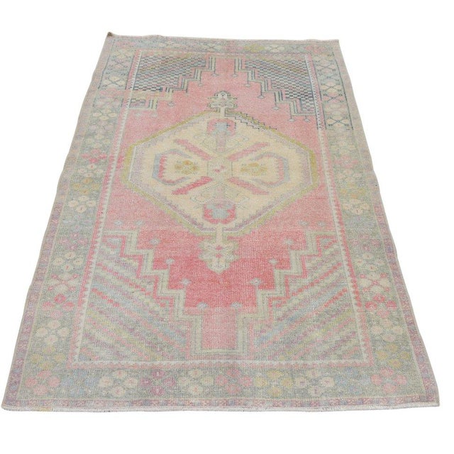 Hand-knotted with care using traditional rug-making techniques, this wool rug blends timeless craftsmanship with a modern...