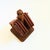 A wonderful set of 6 mid century teak coasters hanging on a matching holder. Each coaster has a lovely concentric circular...