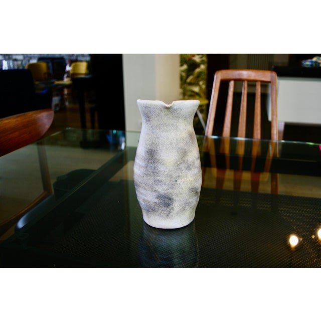 Mid-century marbled glazed ceramic pitcher, well-made, stylized, signed underneath, in good condition This piece has an...