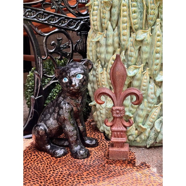 Presenting a one-of-a-kind hand-crafted studio art black leopard figure with gold undertones and sea blue eyes. The photos...