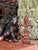 Presenting a one-of-a-kind hand-crafted studio art black leopard figure with gold undertones and sea blue eyes. The photos...