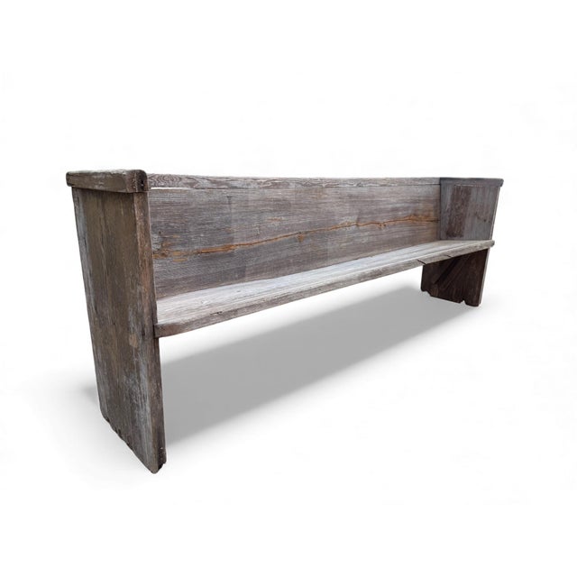An early 20th-century farmhouse church pew bench salvaged from a rural South Carolina farm church. Hand-built from hard...
