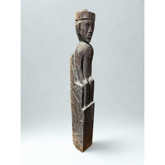 Vintage Dayak Hampatong guardian from Indonesian Borneo, Kalimantan. Hand-carved from solid ironwood, 30.25 inches tall....