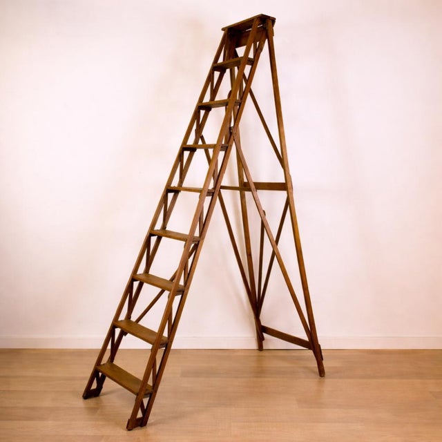 Restored antique wooden ladder with 8 steps. Dimensions when closed: Width – 56 cm Depth – 10.5 cm Height – 202 cm...