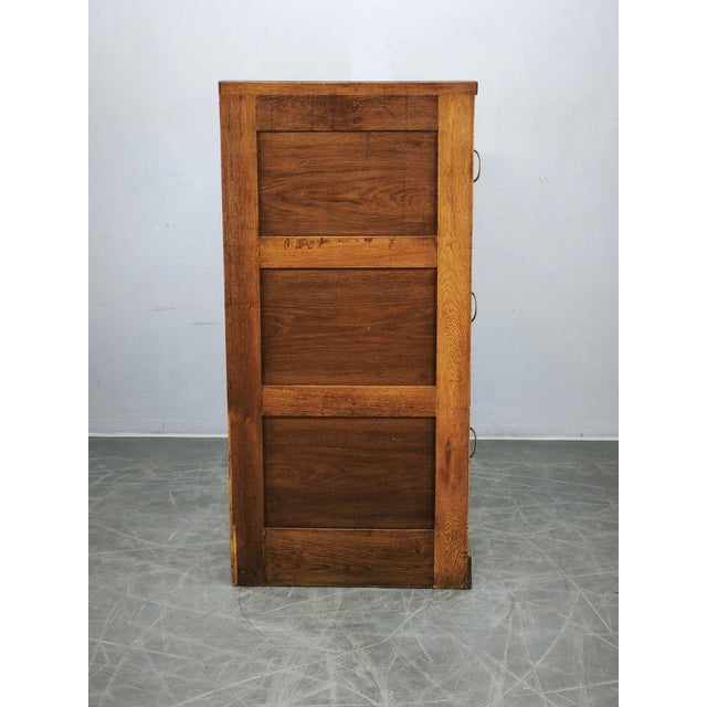 Rare 1930s oak office filing cabinet originating from the Baťa factory in Zlín, Czechoslovakia. This substantial vintage...