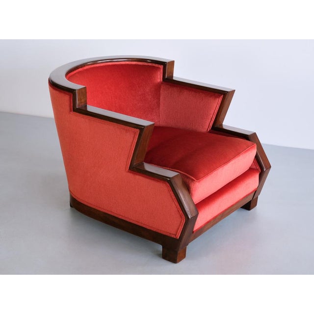 This striking Art Deco armchair was manufactured in Belgium in the mid 1920s. The distinct tiered and angular shape of the...