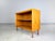 Beautiful small WK Möbel sideboard from the 1960s. The sideboard has two doors and is made of high-quality walnut wood....