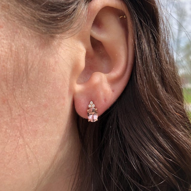 Blushing pink morganite framed by dazzling diamonds in solid 14K gold—these studs know how to steal the spotlight....