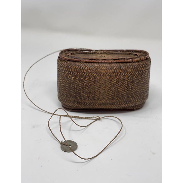 Very nice Vintage Asian Bamboo basket. This is a southeast Asian, Thailand, tobacco storage basket. These baskets are...