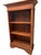 Stunning arts and crafts style solid wood bookcase with reed detailing below the crown molding. The shelves are fixed....