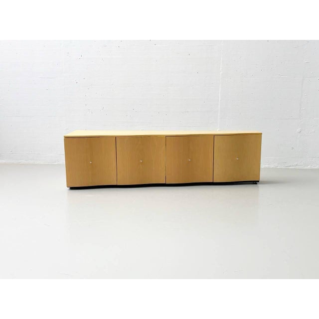 This piece of furniture is a sideboard from the spanish manufacturer punt mobles from valencia, as is clearly evident from...