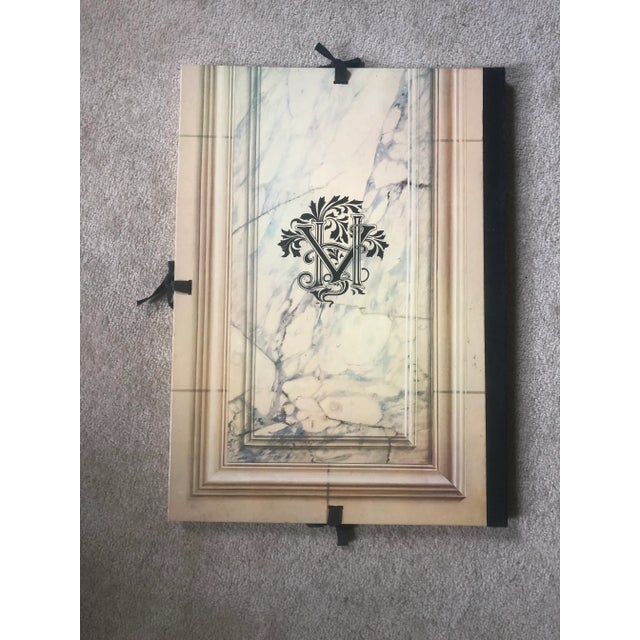 Portfolio sheets in bound cover with ties on three sides. Very good condition 20 page text section, with 24 full color...