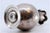Metal Small Silver Vase with Circular Base and Relief on Top For Sale - Image 7 of 10