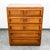 An outstanding Highboy dresser in walnut and walnut veneer by Morris of California. Hard to find style and design. Plenty...