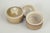 John Andersson for Höganäs, pair of lidded jars. Pair of thrown stoneware lidded jars with cylindrical bodies and fitted...