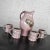 Lovely purple ceramic handmade hot chocolate set includes one pitcher and four cups signed Powell. Beautiful age-...