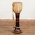 A Burmese tribal Ozi goblet shaped teak drum from the late 19th century, with red and black lacquer and calf skin top....