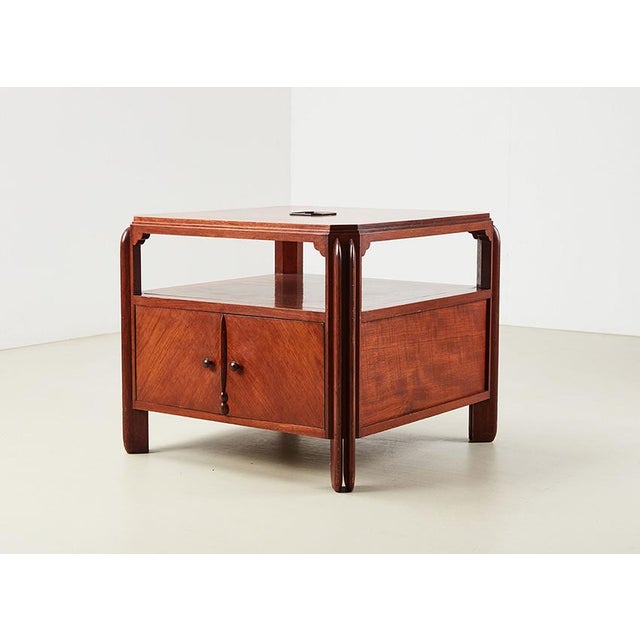 Amsterdamse School coffee table from the Netherlands 1920s. The table is made of mahogany and feature beautiful details,...