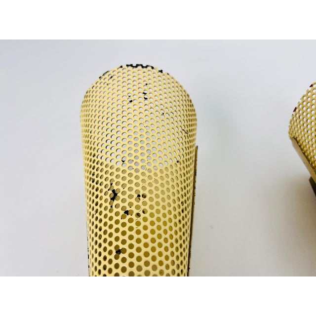 Maison Lunel sconces made in France in the 1960s. The body is made of brass with beautiful metal ornaments. Works with...