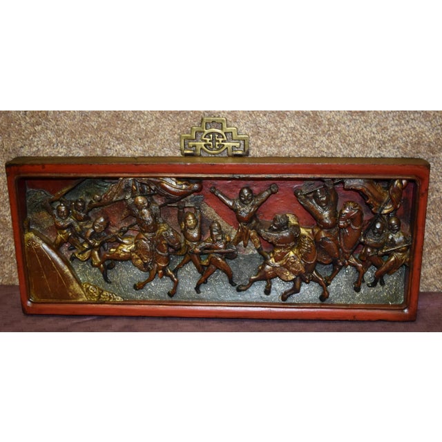 Antique (1920s) Wood Plaque is Asian. Made of Wood. Cinnabar & Gold Finish. Carved Warrior / Figural Details. Brass...