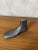 An authentic antique shoe last made of metal. This piece, once used by shoemakers, is now a decorative object prized for...