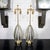 Pair of molded mercury glass table lamps with brass hardware.