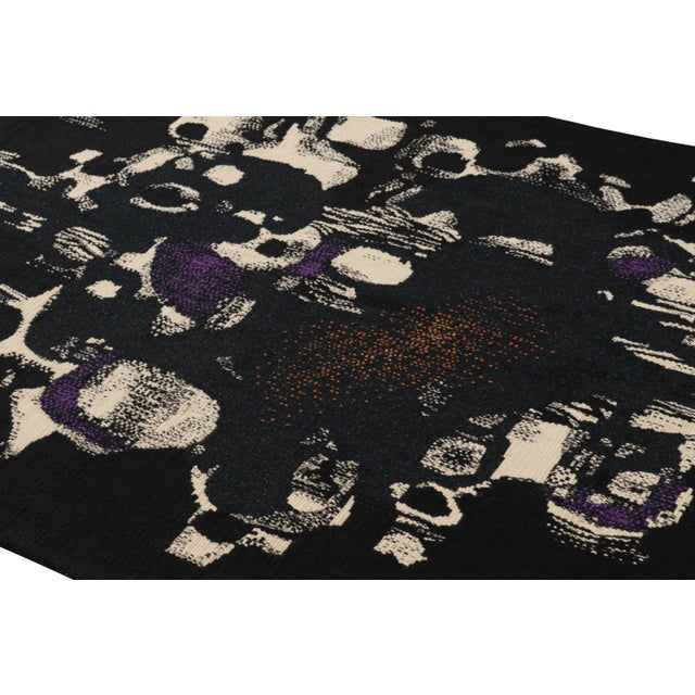 Handwoven in wool and originating from France circa 1965, this 5×7 vintage tapestry is a signed collectible from Andre...