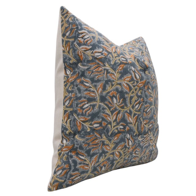 The Kamal Dutta cushion cover features a hand block printed lotus-inspired design, symbolizing purity, renewal, and grace....