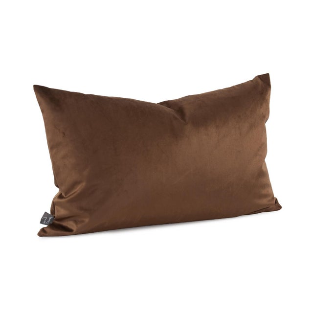 Change up color themes or add pop to a simple sofa or bedding display by piling up the pillows in a multitude of colors,...