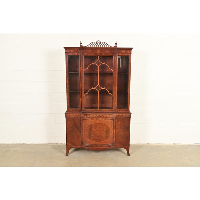 A beautiful Georgian, Chippendale, or Federal style breakfront bookcase cabinet or dining cabinet By Romweber USA, Circa...