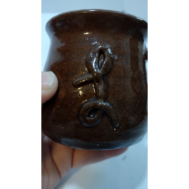This base signature confirms your piece is an authentic work of Southern folk art pottery handcrafted by Cleater Meaders...